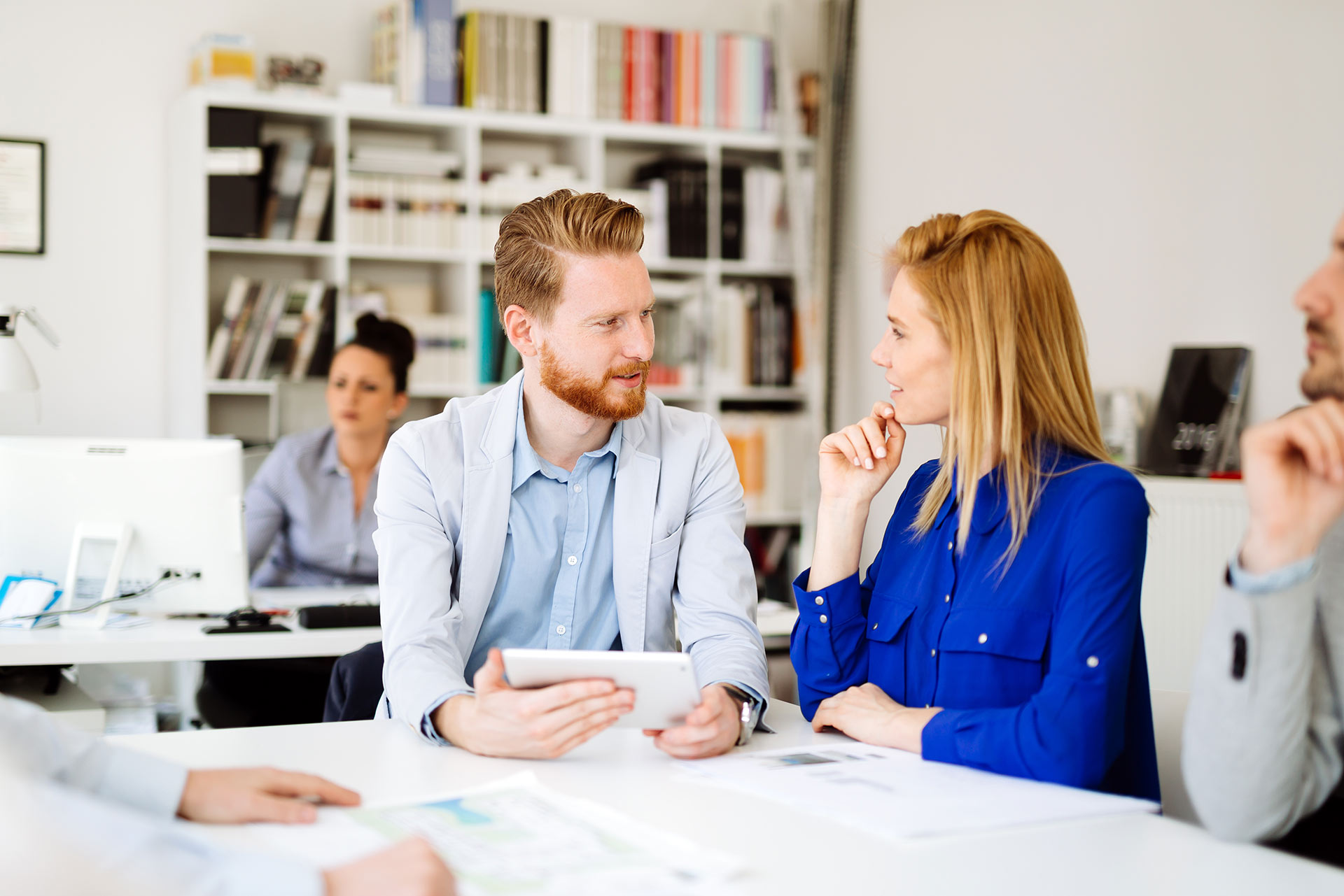 two IT professionals strategizing