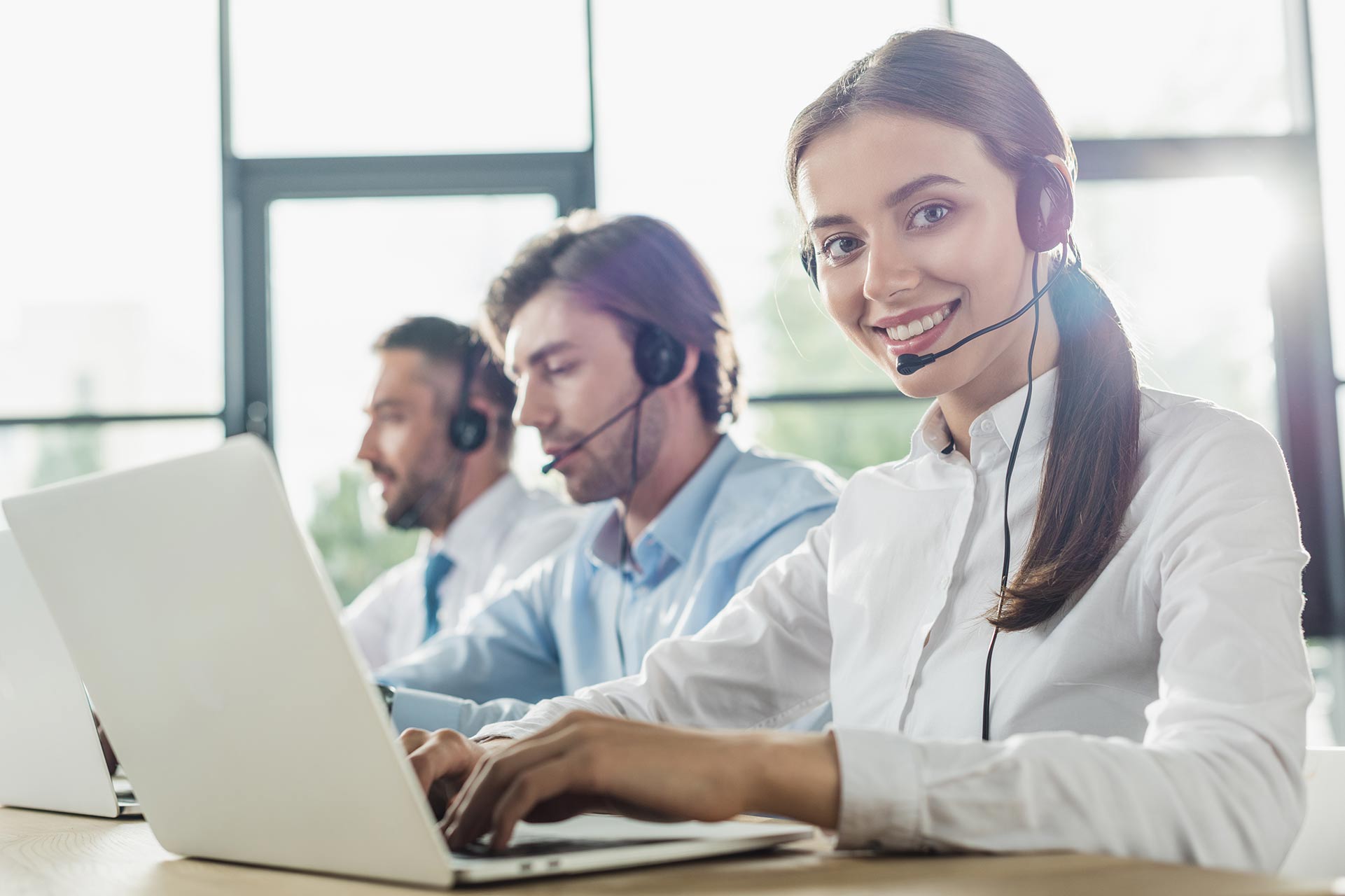 woman smiling from help desk